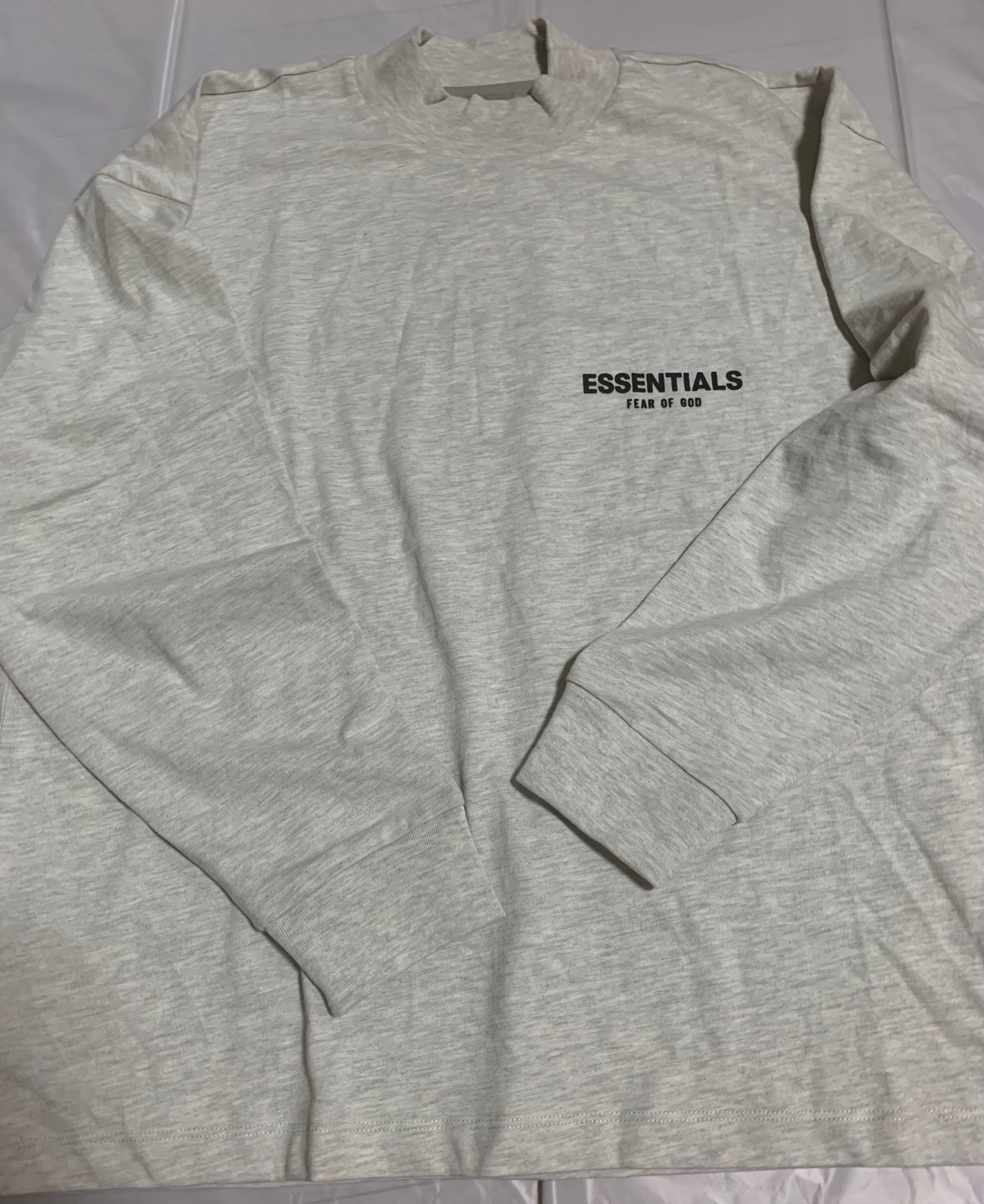 FEAR OF GOD ESSENTIALS BLACK ESS LOGO LS TEE "Light Oatmeal"