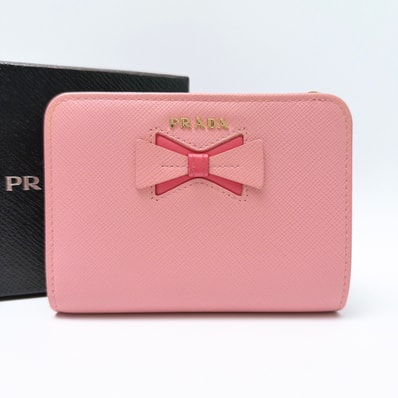 PRADA プラダ サフィアーノ フィオッコ 二つ折り財布 コンパクトウォレット 小銭入れあり リボン ピンク レディース 1ML018
