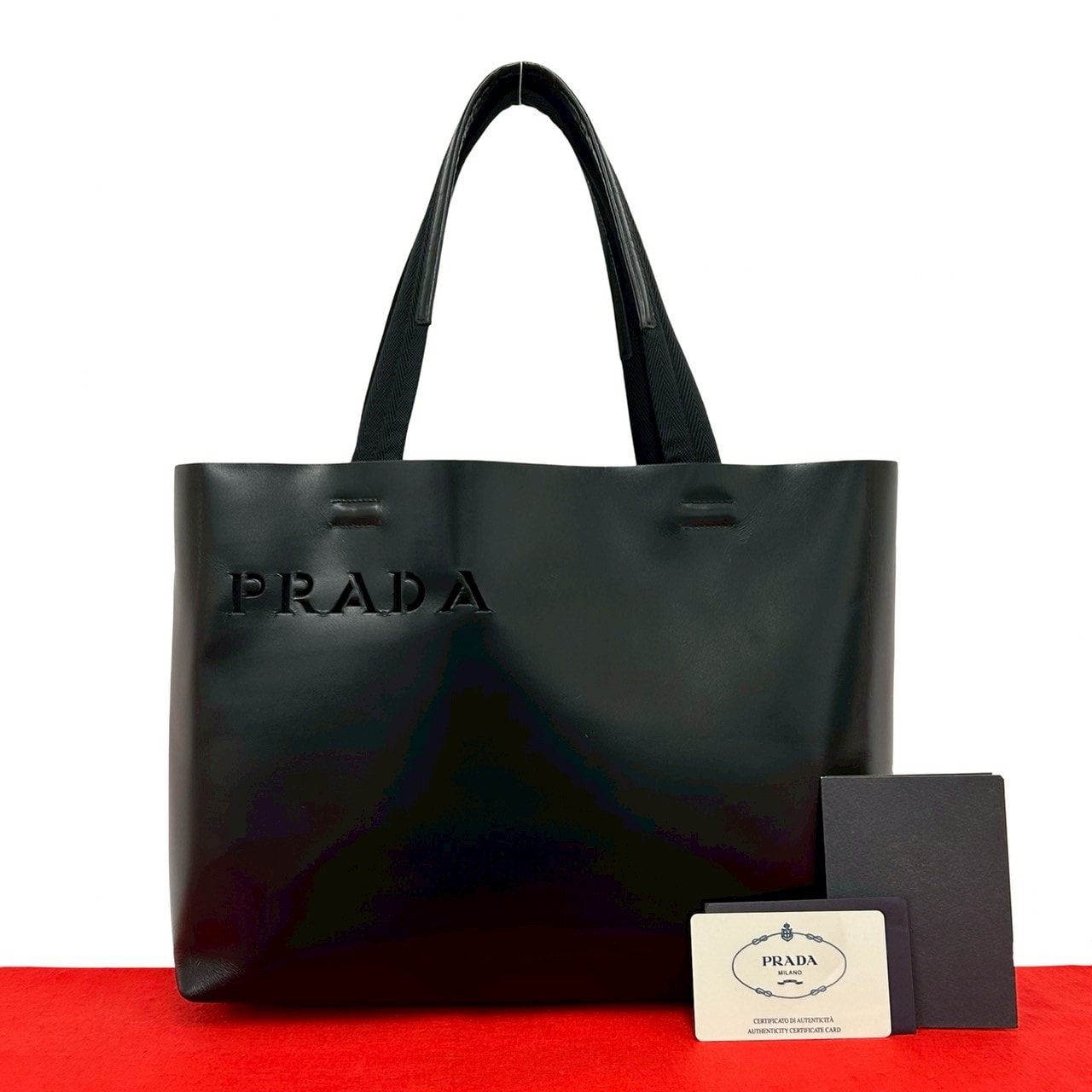 B (目立った傷や汚れなし)】PRADA プラダ パンチング ロゴ 型抜き