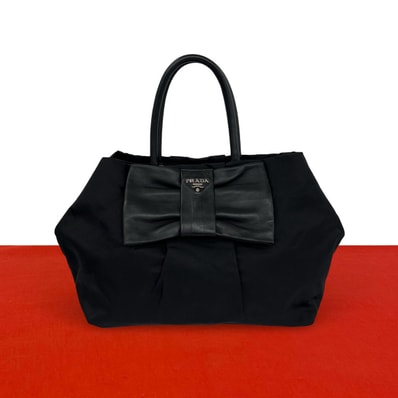 PRADA プラダ ロゴ 金具 ナイロン レザー ハンドバッグ ブラック
97695