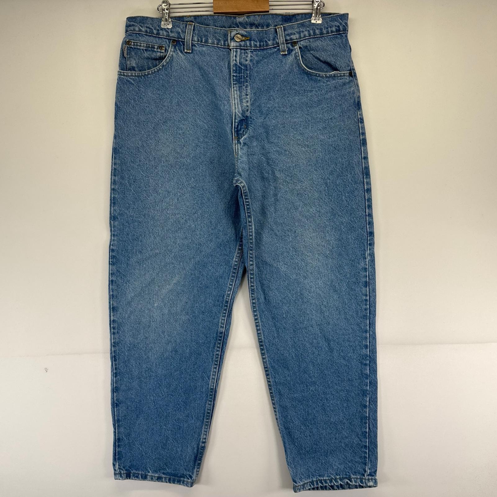 古着 カーハート Carhartt デニム パンツ テーパード ワンポイントロゴ 大きいサイズ ジーパン w40×L30  ブルー系 メンズ
