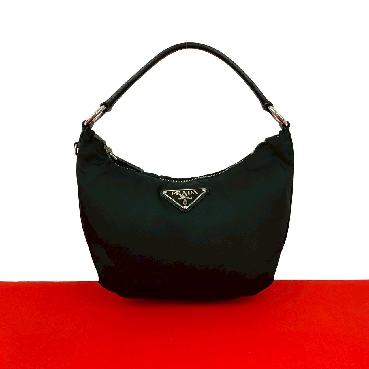 PRADA プラダ 三角ロゴ 金具 ナイロン レザー ハンドバッグ ブラック
 32109