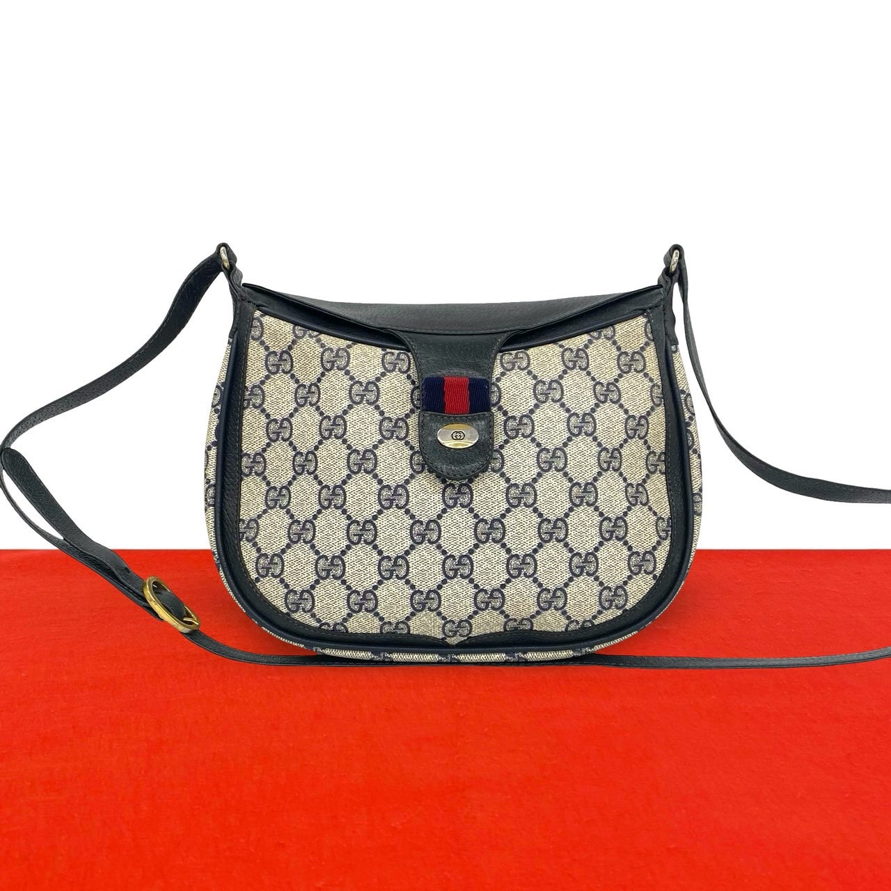 GUCCI グッチ シェリーライン GG 柄 ロゴ 金具 レザー PVC ショルダーバッグ ネイビー
35582