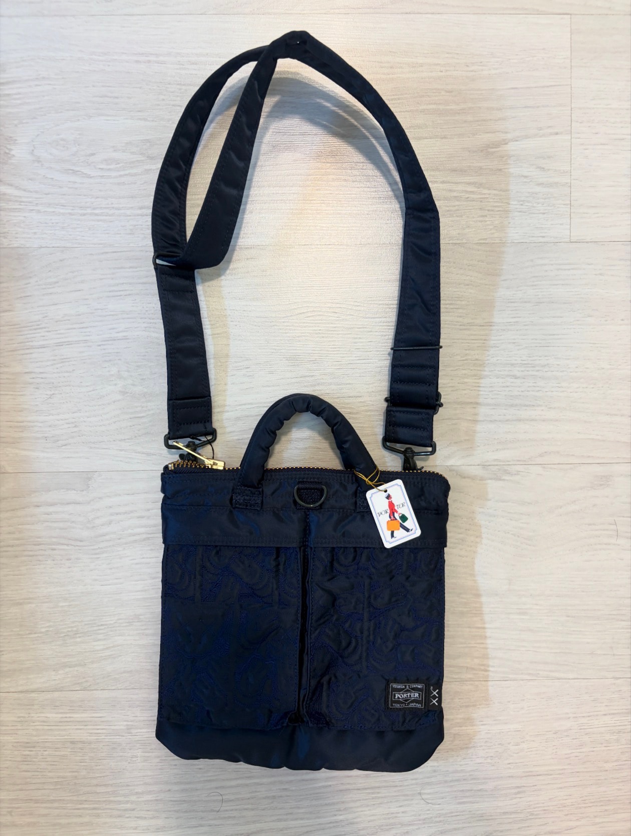 PORTER TANKER x KAWS 2Way Helmet Bag "Iron Blue"