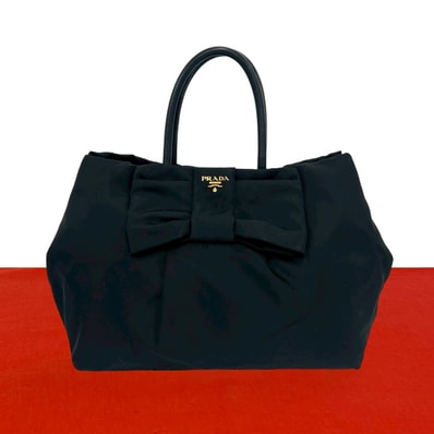 PRADA プラダ ロゴ 金具 リボン モチーフ ナイロン レザー ハンドバッグ ブラック
037-1