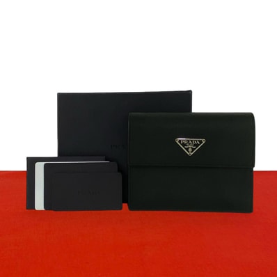PRADA プラダ 三角 ロゴ 金具 レザー 二つ折り財布 ブラック
78864
