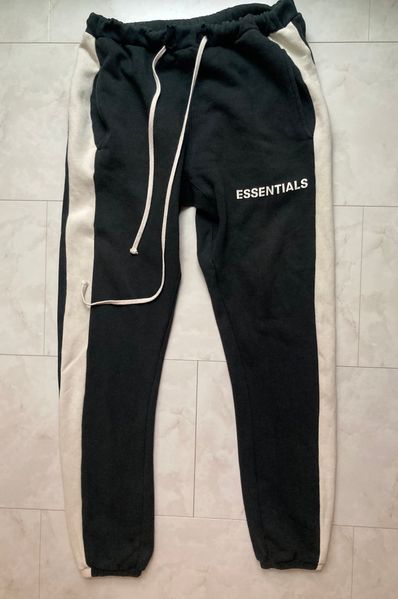 Fear of god essentials discount side stripe sweatpants black