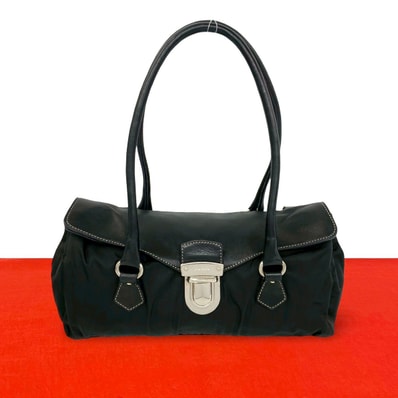 PRADA プラダ ロゴ 金具 レザー ナイロン ハンドバッグ ブラック
21864
