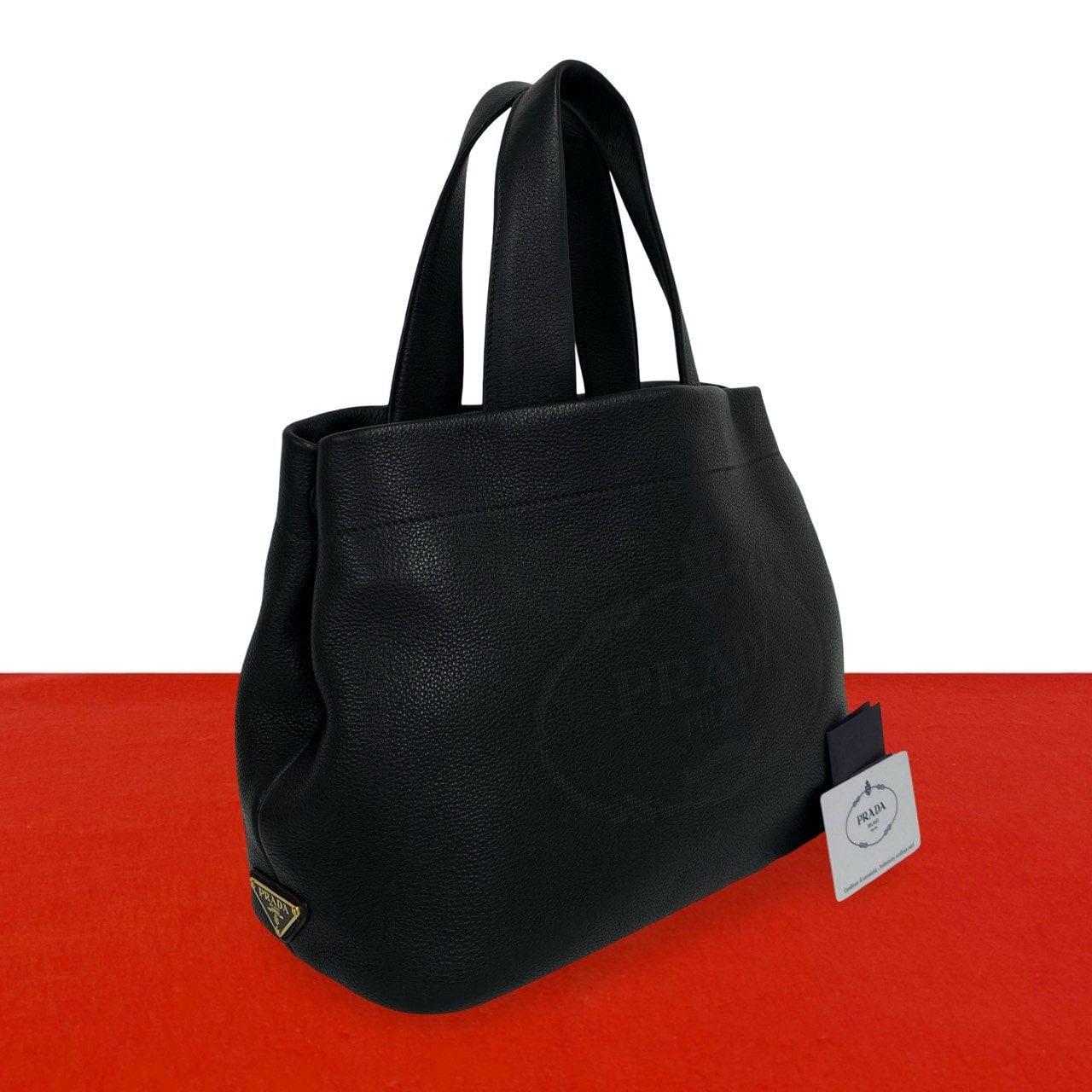 PRADA プラダ 三角ロゴ 金具 パンチング レザー ハンドバッグ ブラック
 61023