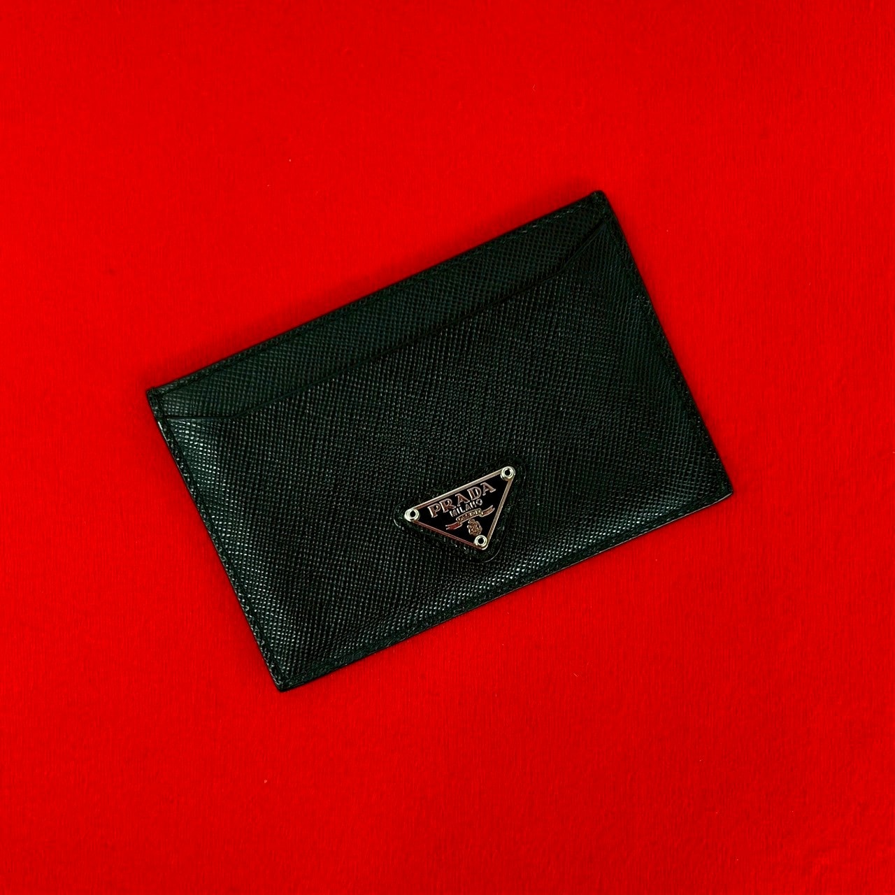 PRADA プラダ 三角ロゴ 金具 レザー カードケース ブラック
 58028