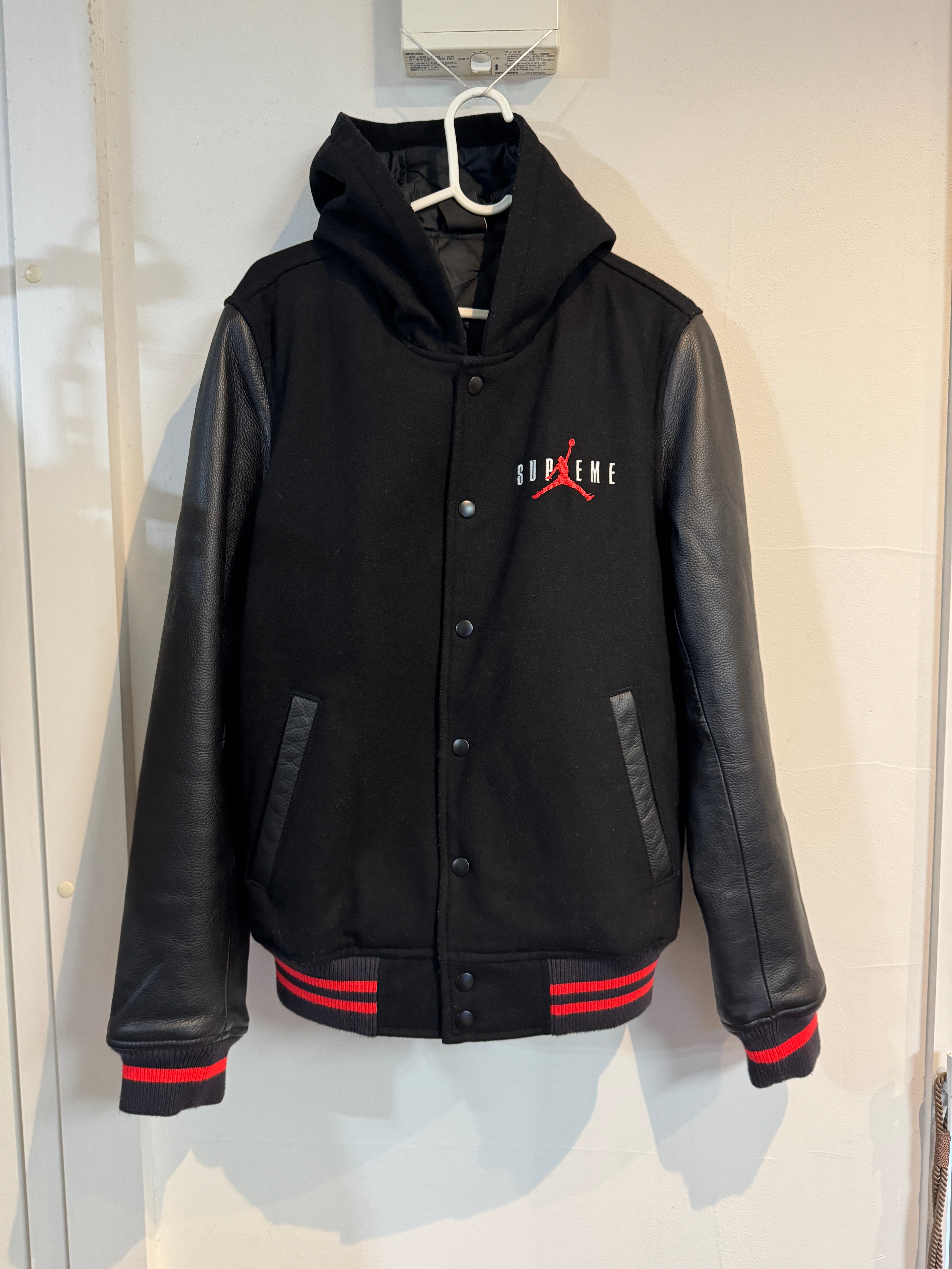 Supreme x Jordan Hooded Varsity Jacket "Black"