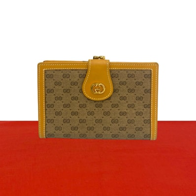 GUCCI グッチ マイクロGG ロゴ 金具 レザー PVC 二つ折り財布 ブラウン
28408