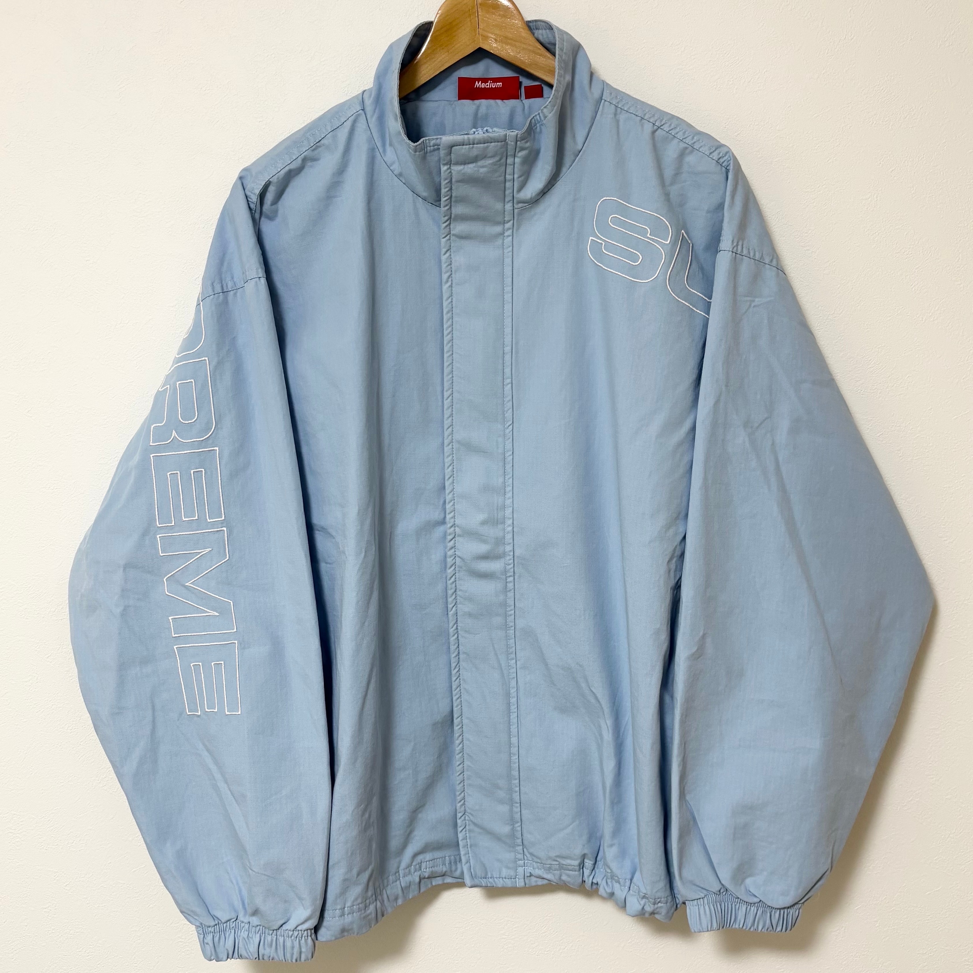 Supreme Spellout Embroidered Ripstop Track Jacket "Light Blue"
