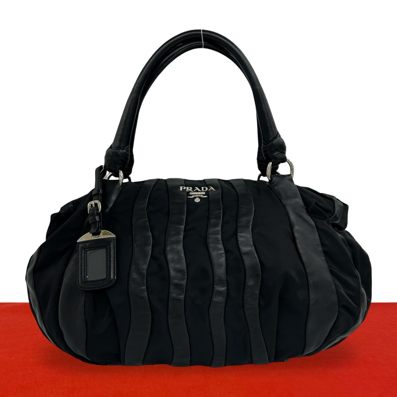 PRADA プラダ ロゴ 金具 ナイロン レザー ハンドバッグ ブラック
27999