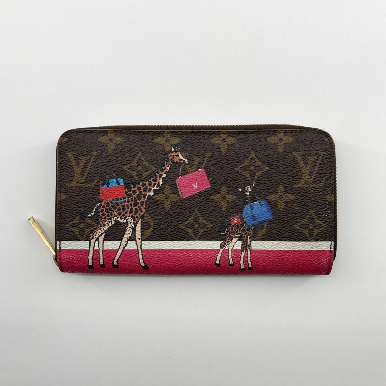 LOUIS VUITTON(ルイ・ヴィトン) モノグラム キリンプリント ジッピーウォレット 2017年 クリスマス限定 コーティングキャンバス  / グレインレザー M62085 長財布 248.9g ブラウン×ピンク