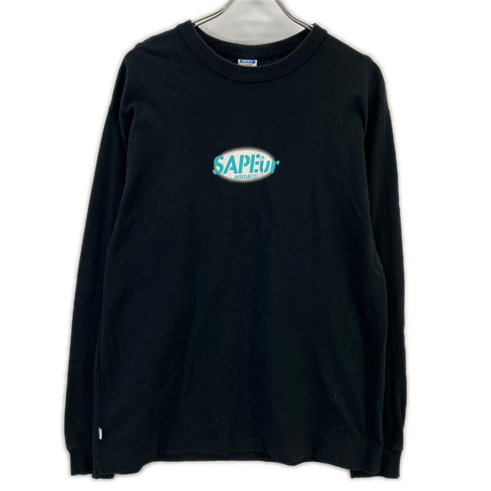 サプール 24AW ﾌﾞﾗｯｸ×ﾌﾞﾙｰ OVAL LOGO L/S Tee L