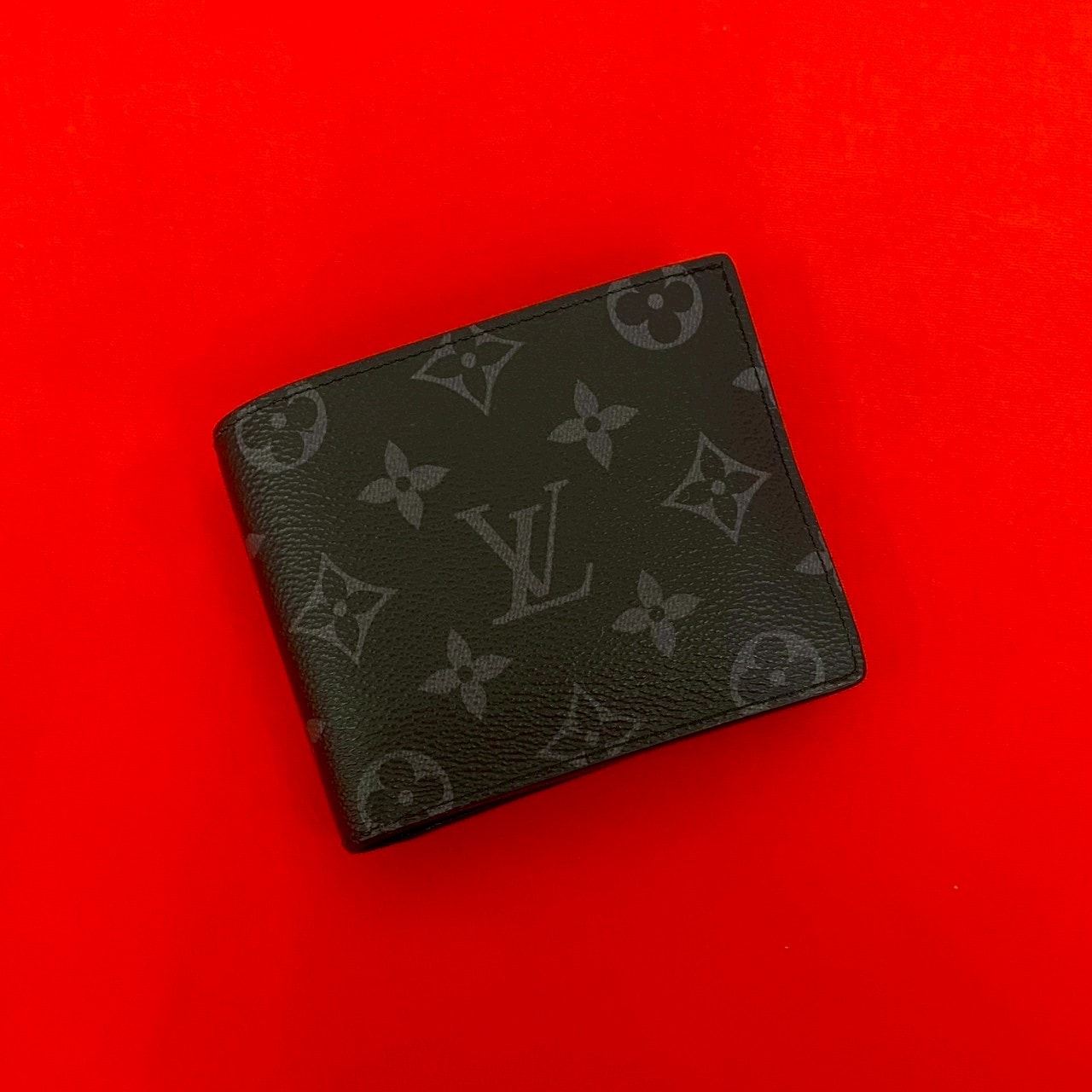 LOUIS VUITTON ルイヴィトン ポルトフォイユ マルコ NM モノグラムエクリプス レザー PVC 二つ折り財布 ブラック
31729