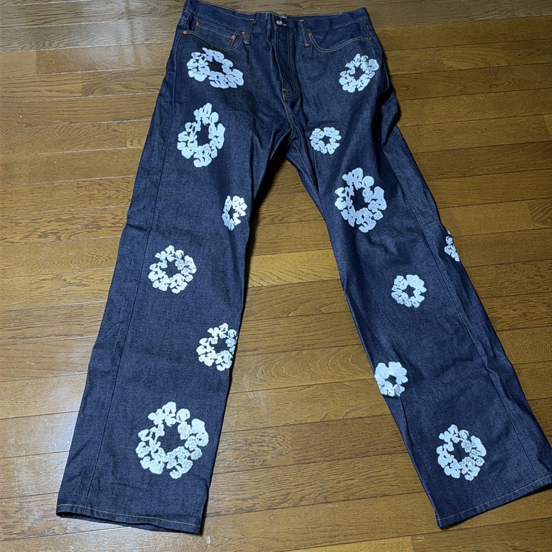 DENIM TEARS Baggy Cotton Wreath Denim Pant "Selvedge"