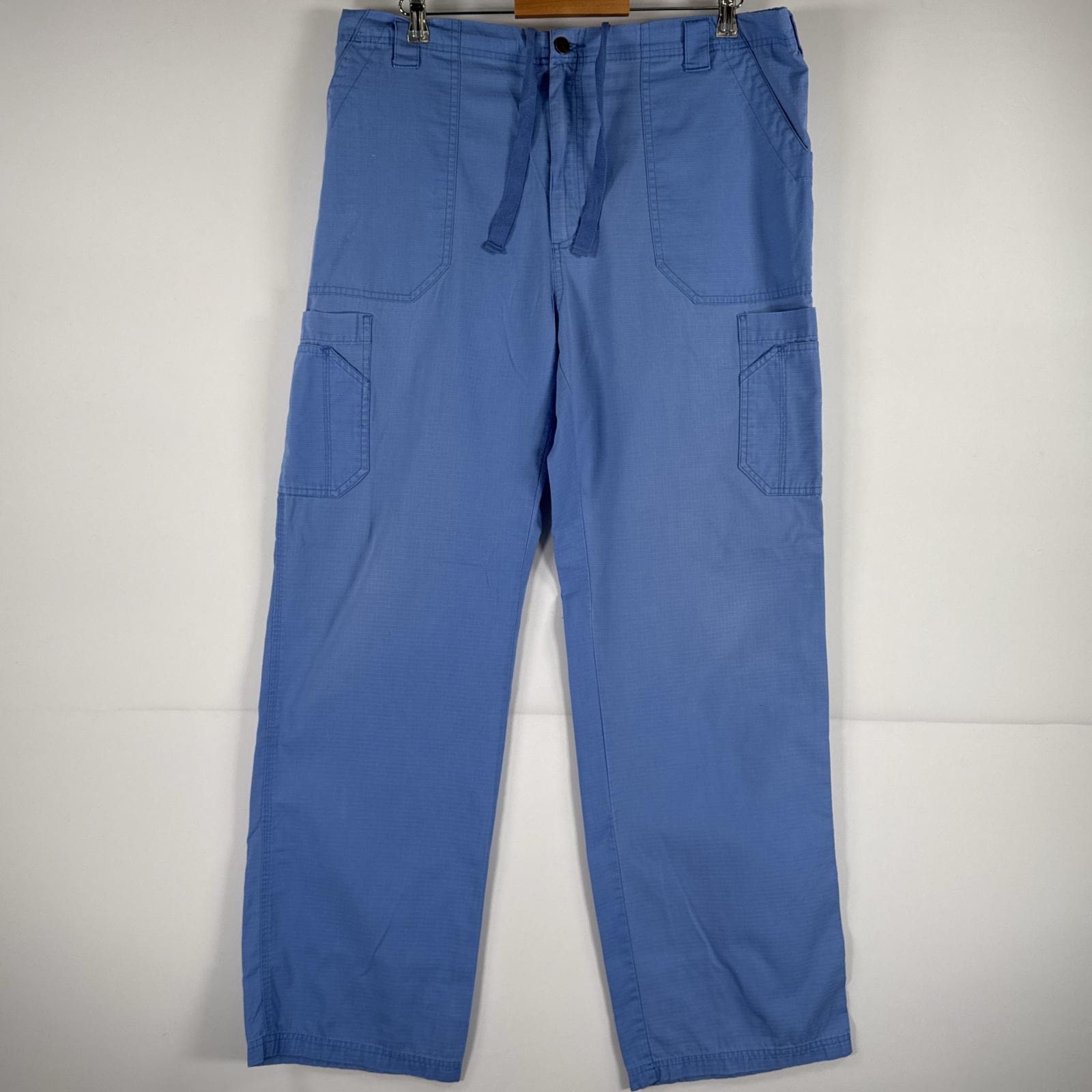 古着 カーハート Carhartt ワークパンツ イージーパンツ コットン 作業着 ワンポイント ロゴ ストレート 大きいサイズ 水色 メンズ