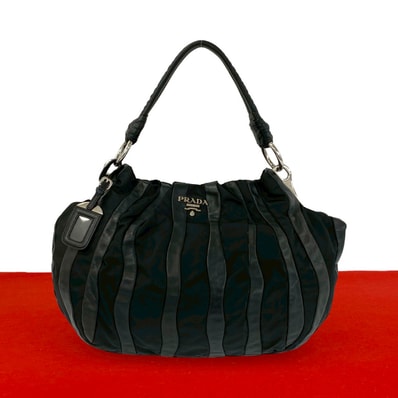 PRADA プラダ ロゴ 金具 ナイロン レザー トートバッグ ブラック
37079