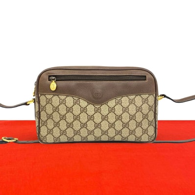 GUCCI グッチ GG ロゴ 柄 レザー PVC ショルダーバッグ ブラウン
23970