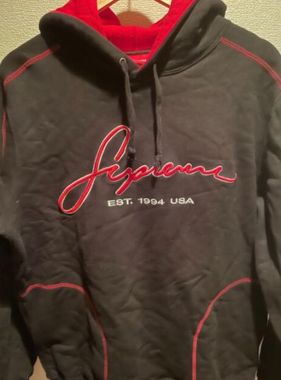 Contrast embroidered hooded sales sweatshirt