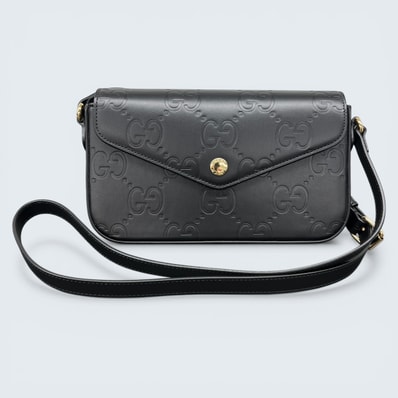 GUCCI 展示品級美品 グッチ GG SUPER MINI GG スーパー ミニ エンボス ショルダーバッグ 772794 レザー ブラック クロスボディ ポシェット 型押し ダブルG SAランク 中古 鑑定済 グッチバッグ