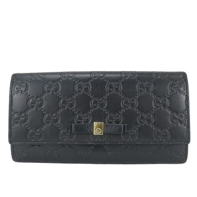 【中古】 グッチ 長財布(かぶせ蓋) リボン 388679 シマレザー ブラック ゴールド金具 グッチシマ 二つ折り レディース 女性 GUCCI