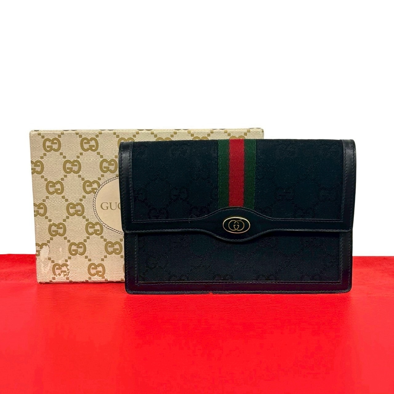 GUCCI グッチ シェリーライン GG ロゴ 金具 キャンバス レザー ポーチ ブラック
79409