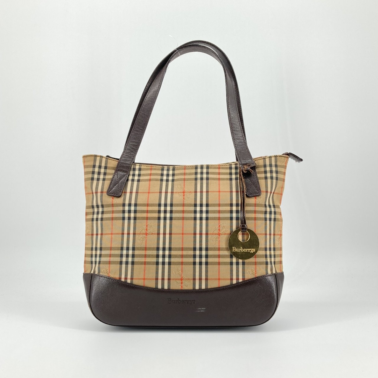 BURBERRY(バーバリー) ノバチェック シャドウホース サークルロゴチャーム付 レザー トートバッグ ブラウン