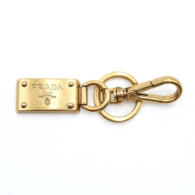 PRADA(プラダ) ヴィンテージ キーリング キーホルダー バッグチャーム ロゴプレート ゴールド メタル ナスカン 丸型リング レディース メンズ ユニセックス 【中古】