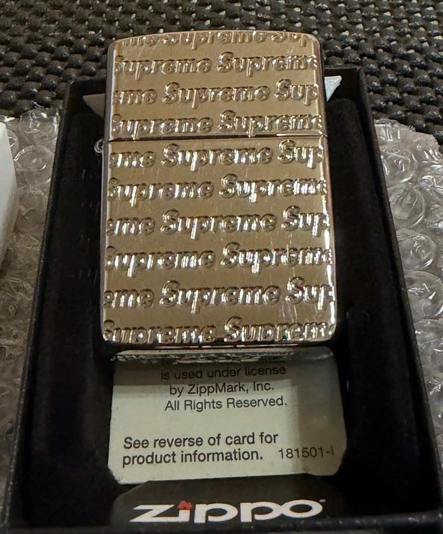 Supreme Repeat Engraved Zippo "Silver"