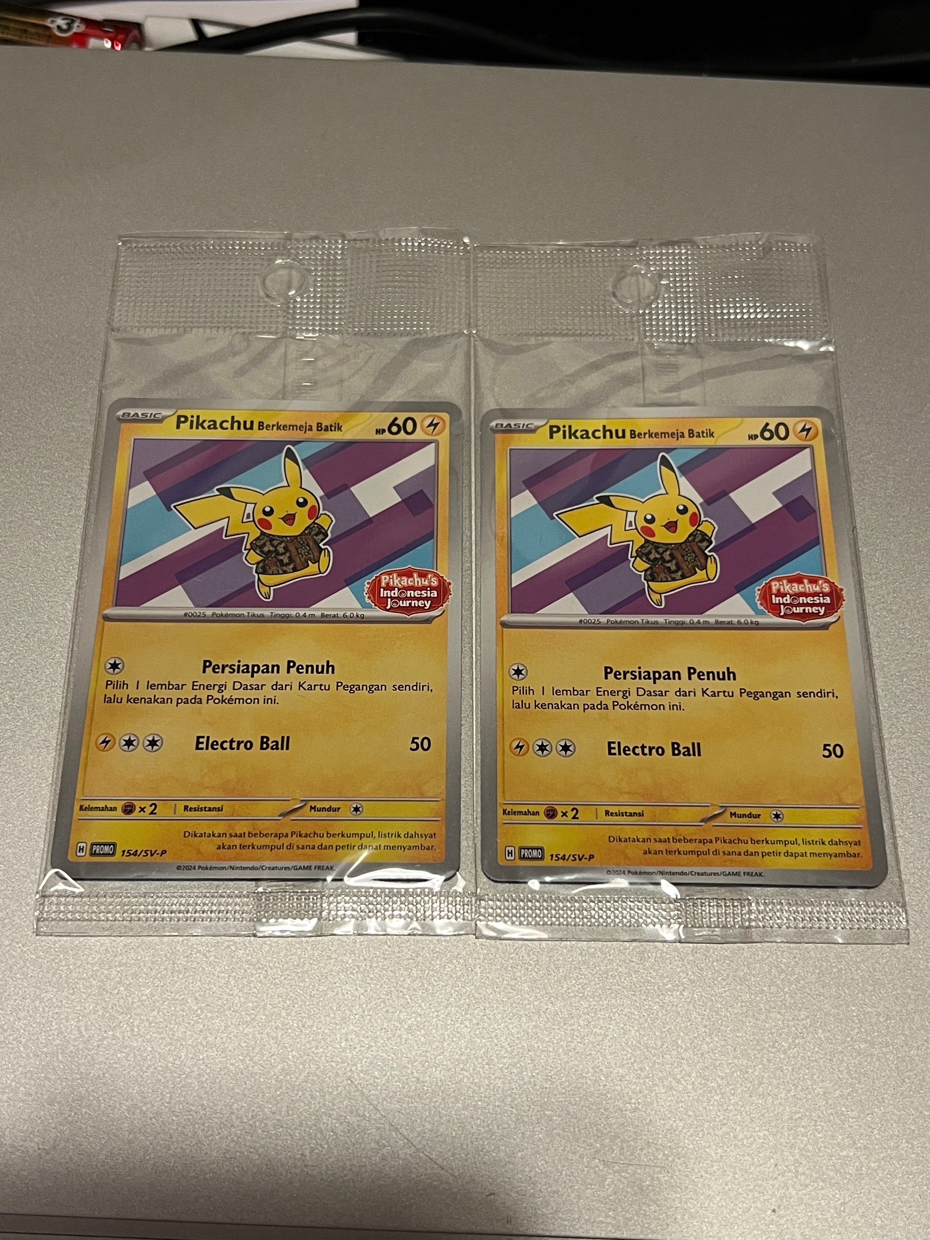 PSA10】バティックシャツを着たピカチュウ (ネイティオ柄) P [SV-P 154