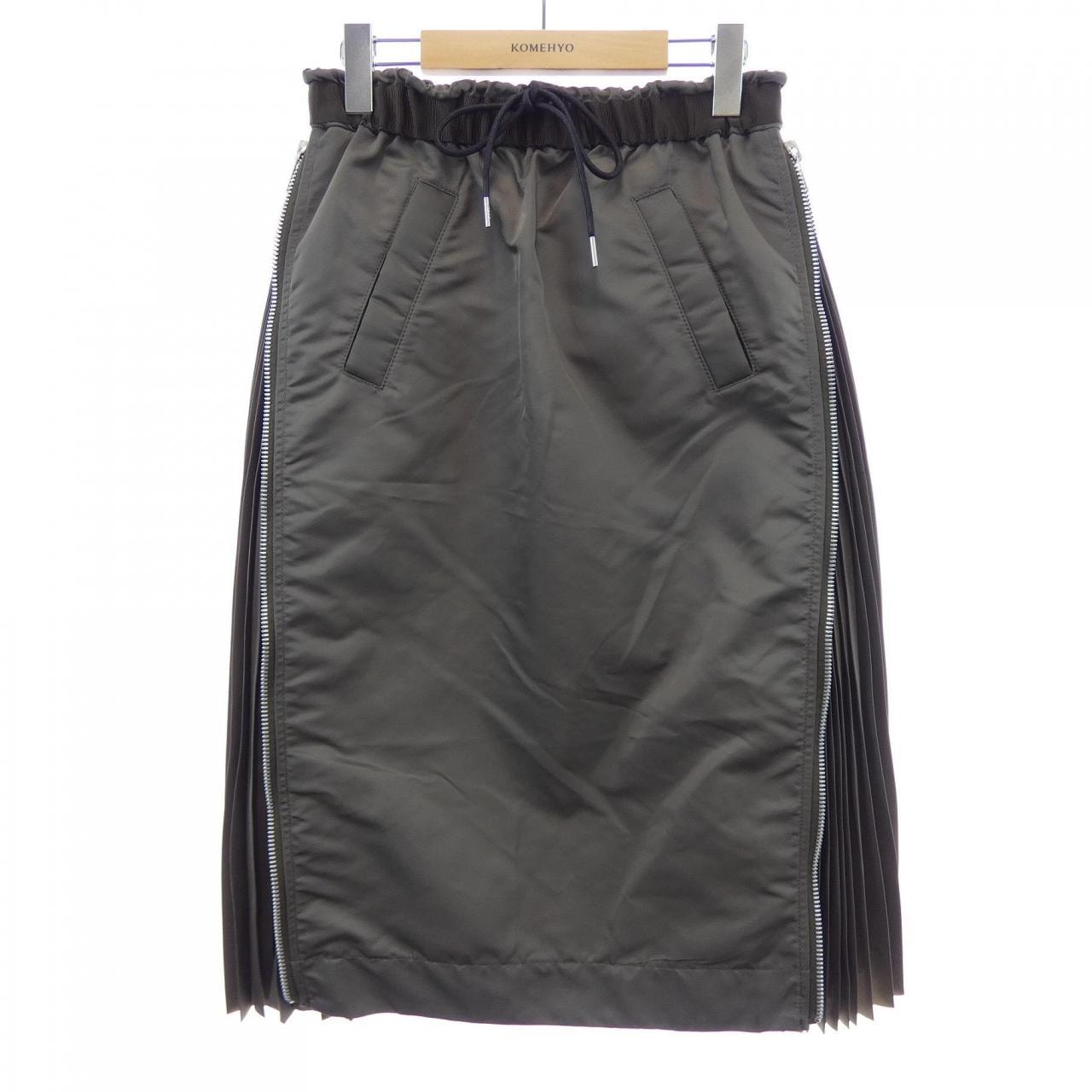 sacai x KAWS Track Shorts トラックショーツ