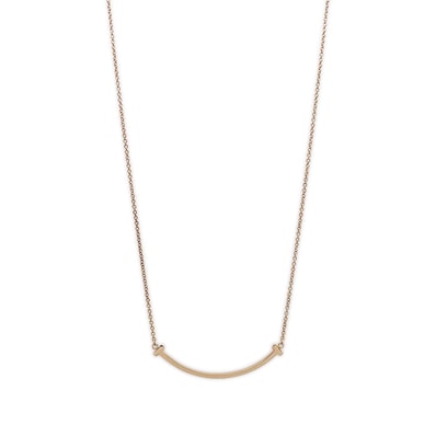 TIFFANY&Co. ティファニー Tスマイル スモール ネックレス
ペンダント K18PG ゴールド 新品仕上済 ユニセックス
【中古】
