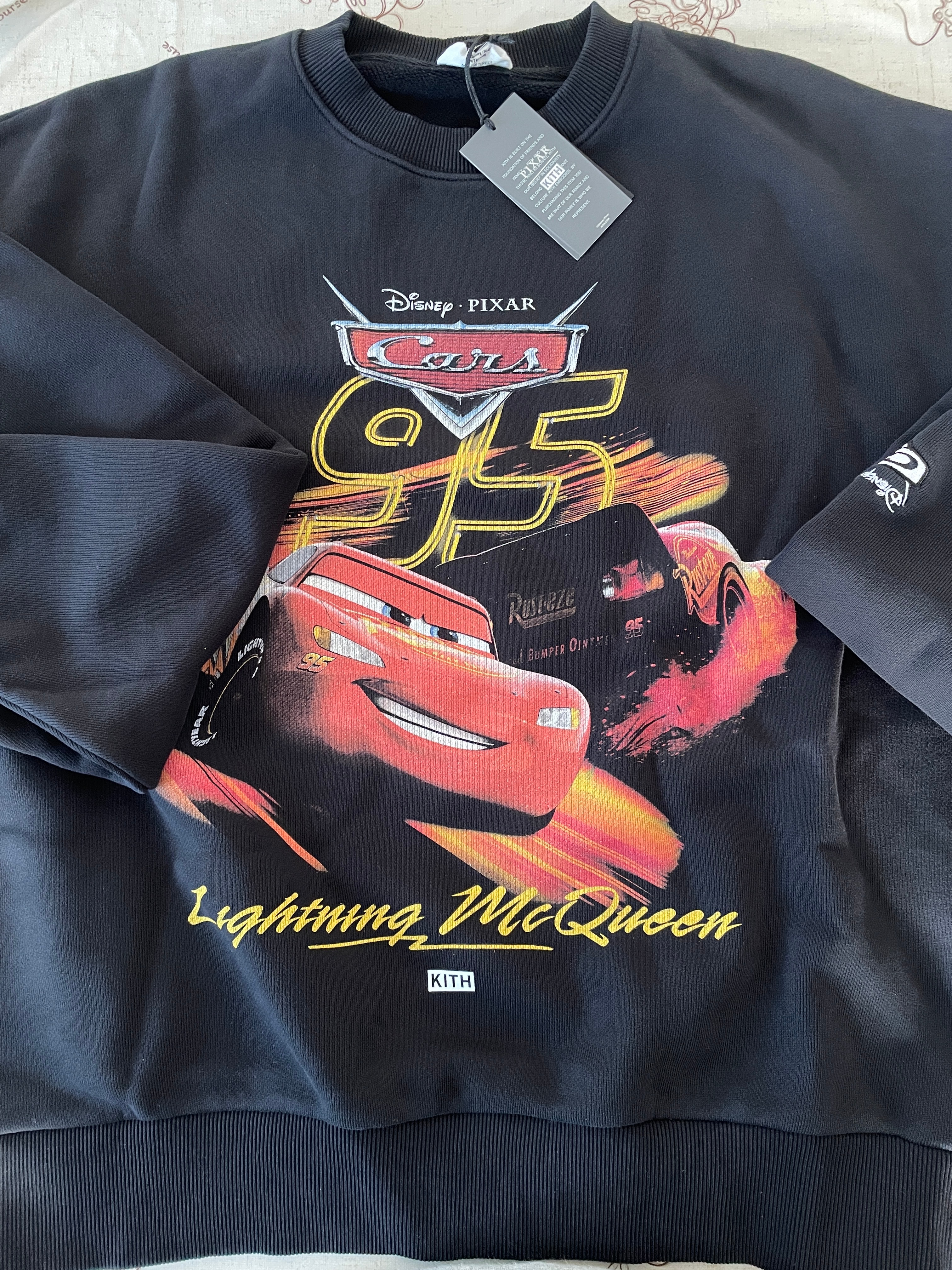 Kith x Disney Pixar Lightning McQueen Nelson Crewneck "Black"
