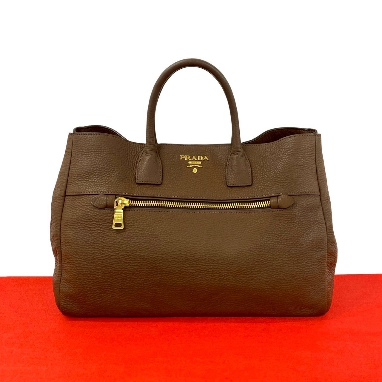 PRADA プラダ ロゴ 金具 レザー ハンドバッグ ブラウン
37011