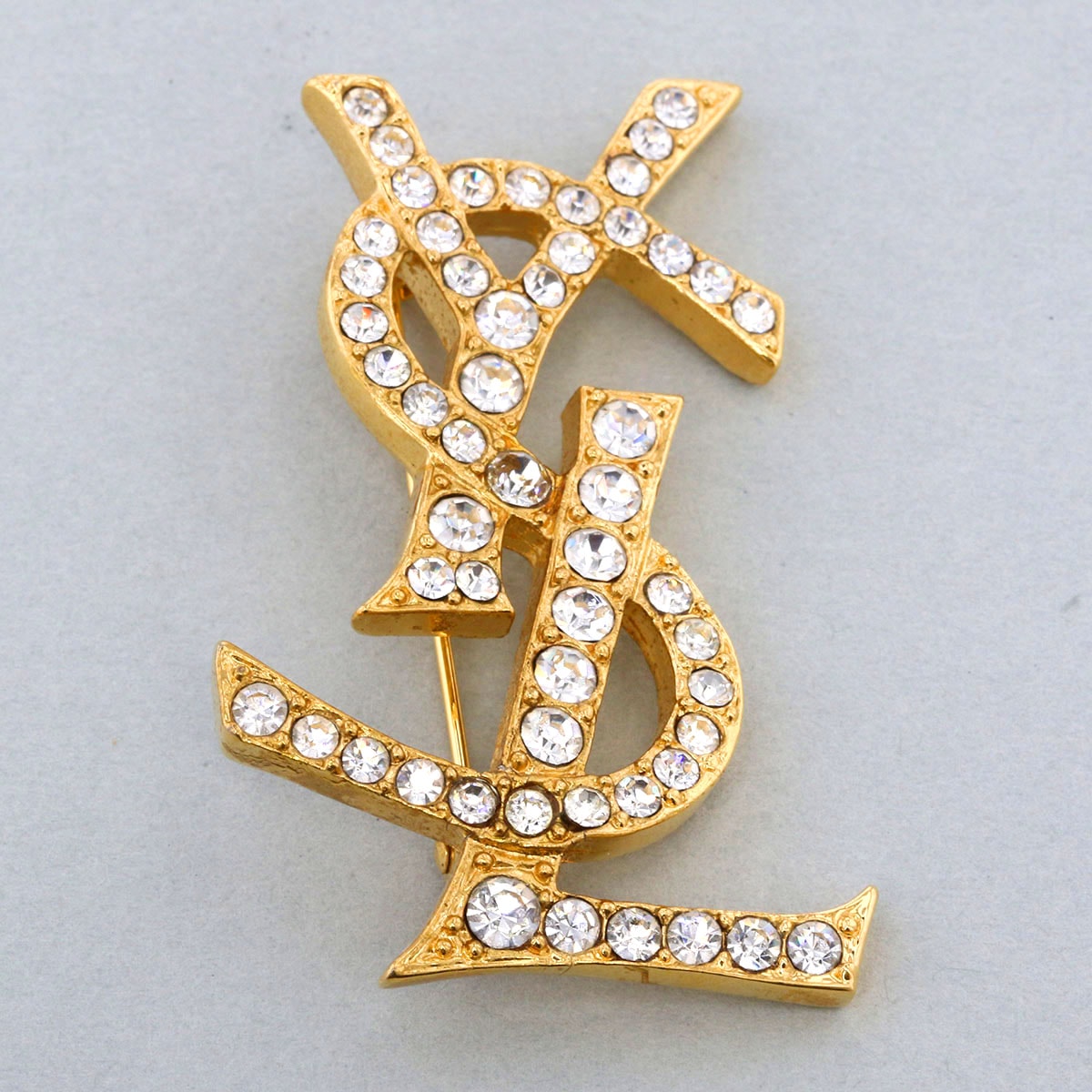 YVES SAINT LAURENT イヴ・サンローラン YSLロゴ ライトストーン ブローチ ブローチ GP ゴールド レディース【中古】