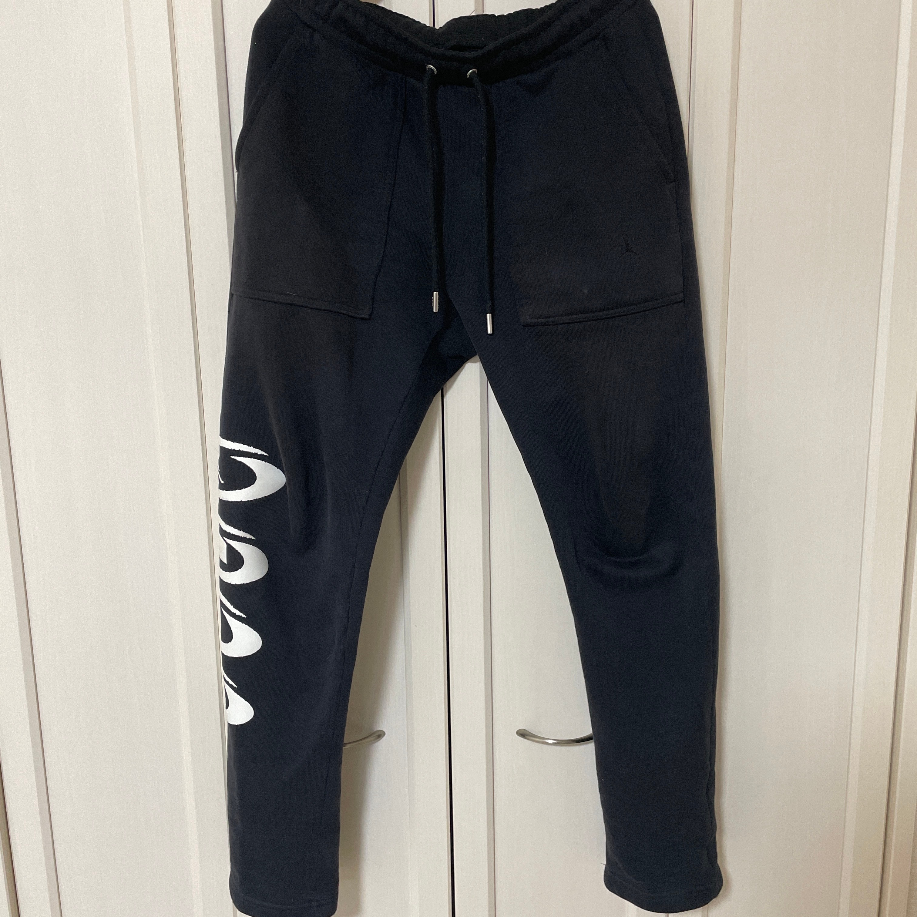 ジョーダン x トラヴィス スコット メンズ フリースパンツ・スウェットパンツ