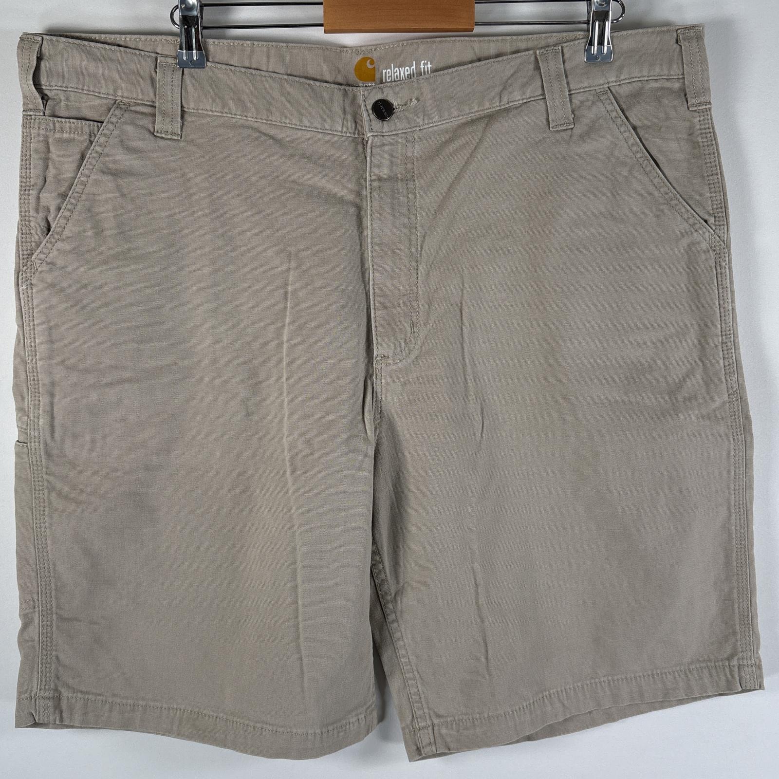 古着 カーハート Carhartt ダック ショートパンツ 大きいサイズ ワークショーツ ワンポイント サイドポケット w42  ベージュ系 メンズ