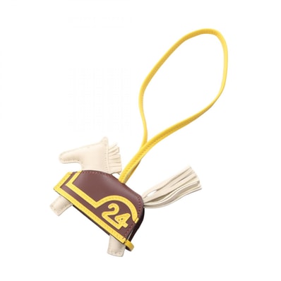 エルメス HERMES ロデオPM ロベオ24 クレ テール ジョーヌナプル チャーム アクセサリー アニョーミロ / ヴォースイフト アニョーミロ K刻印(2025年製造) レディース アイボリー系 / ブラウン系 / イエロー系