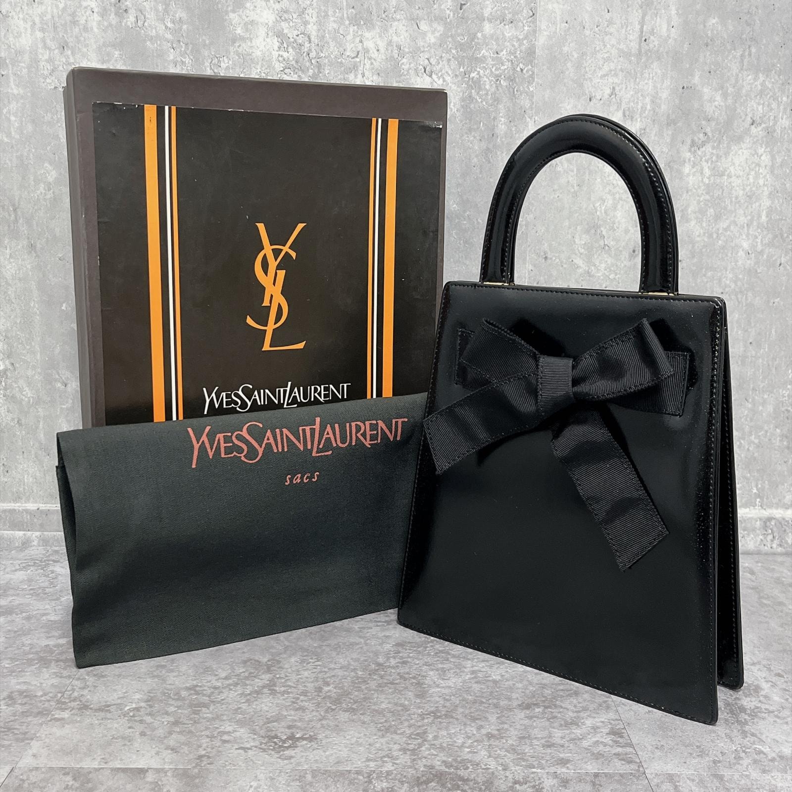 【Yves Saint Laurent】イヴサンローラン ハンドバッグ 箱・保存袋付き リボン レザー ブラック 黒 レディース 日本製 フォーマル 手提げ