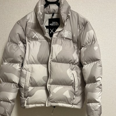 The North Face Kaws Retro 1996 Nuptse Jacket "Moonlight Ivory"