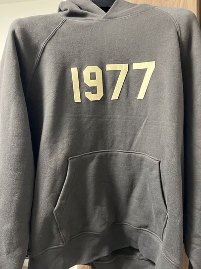 FEAR OF GOD ESSENTIALS 1977 HOODIE "Iron"