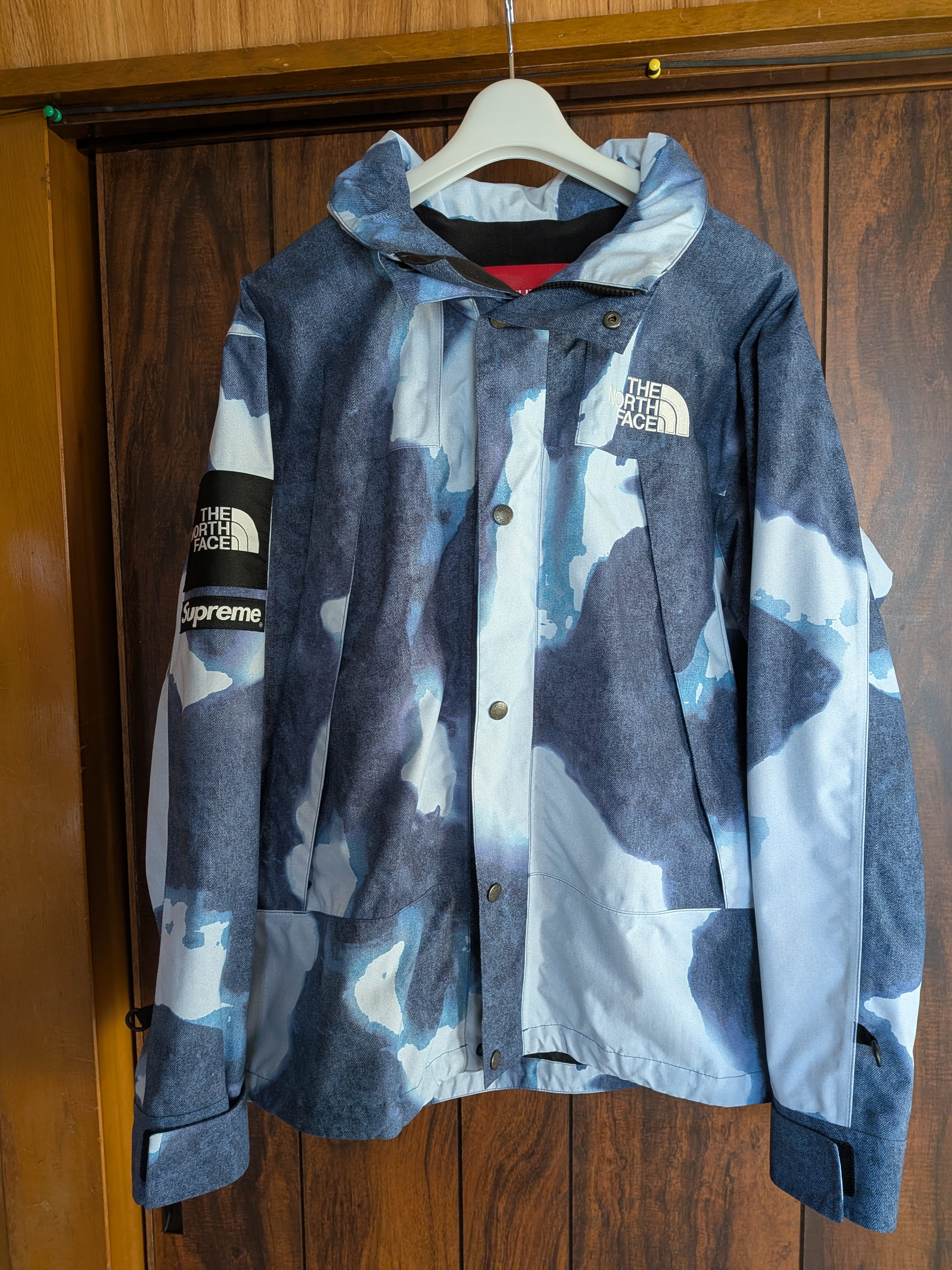 Supreme x The North Face Bleached Denim Print Mountain Jacket