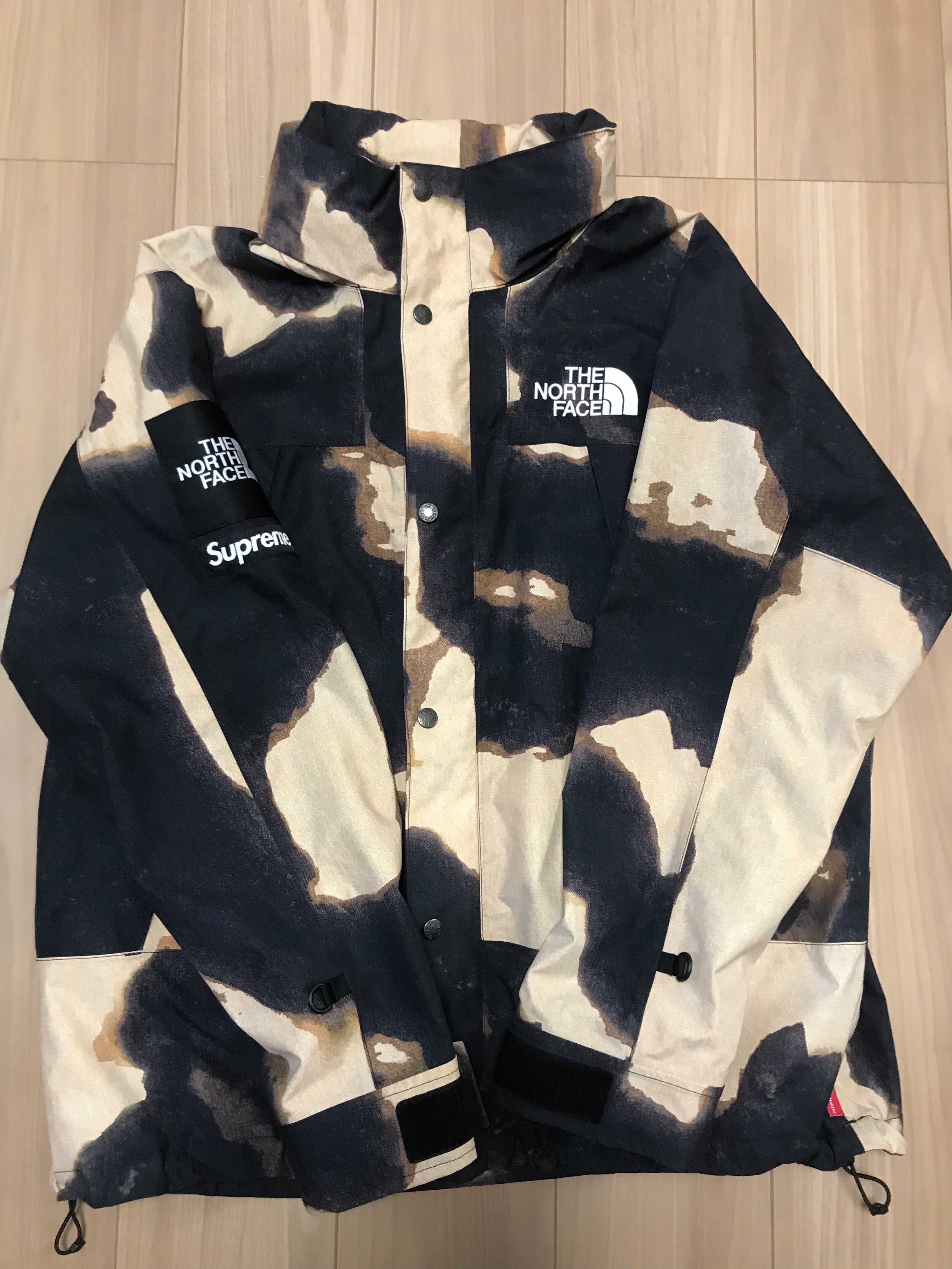 Supreme x The North Face Bleached Denim Print Mountain Jacket