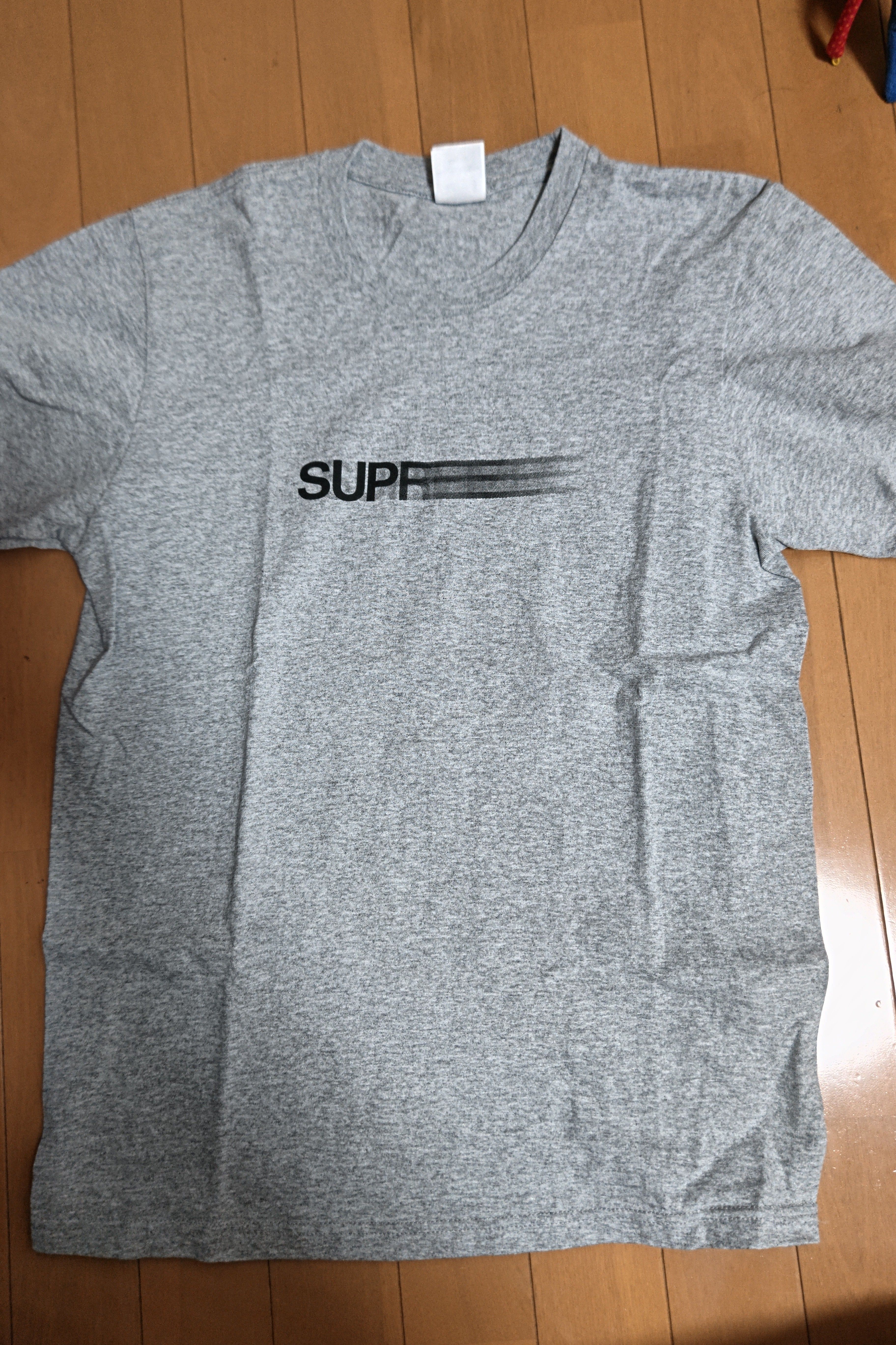 Supreme Motion Logo Tee "Heather Grey" (23SS)