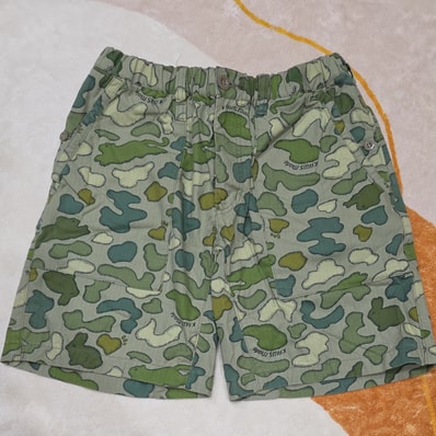 HUMAN MADE x KAWS Made Camo Shorts "Green"