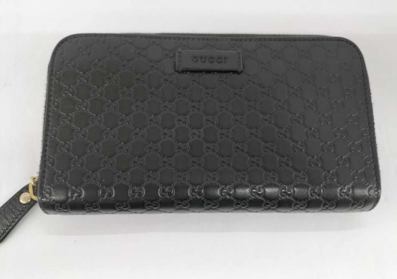 GUCCI Micro Guccissima Round Fastener Wallet "Black"
