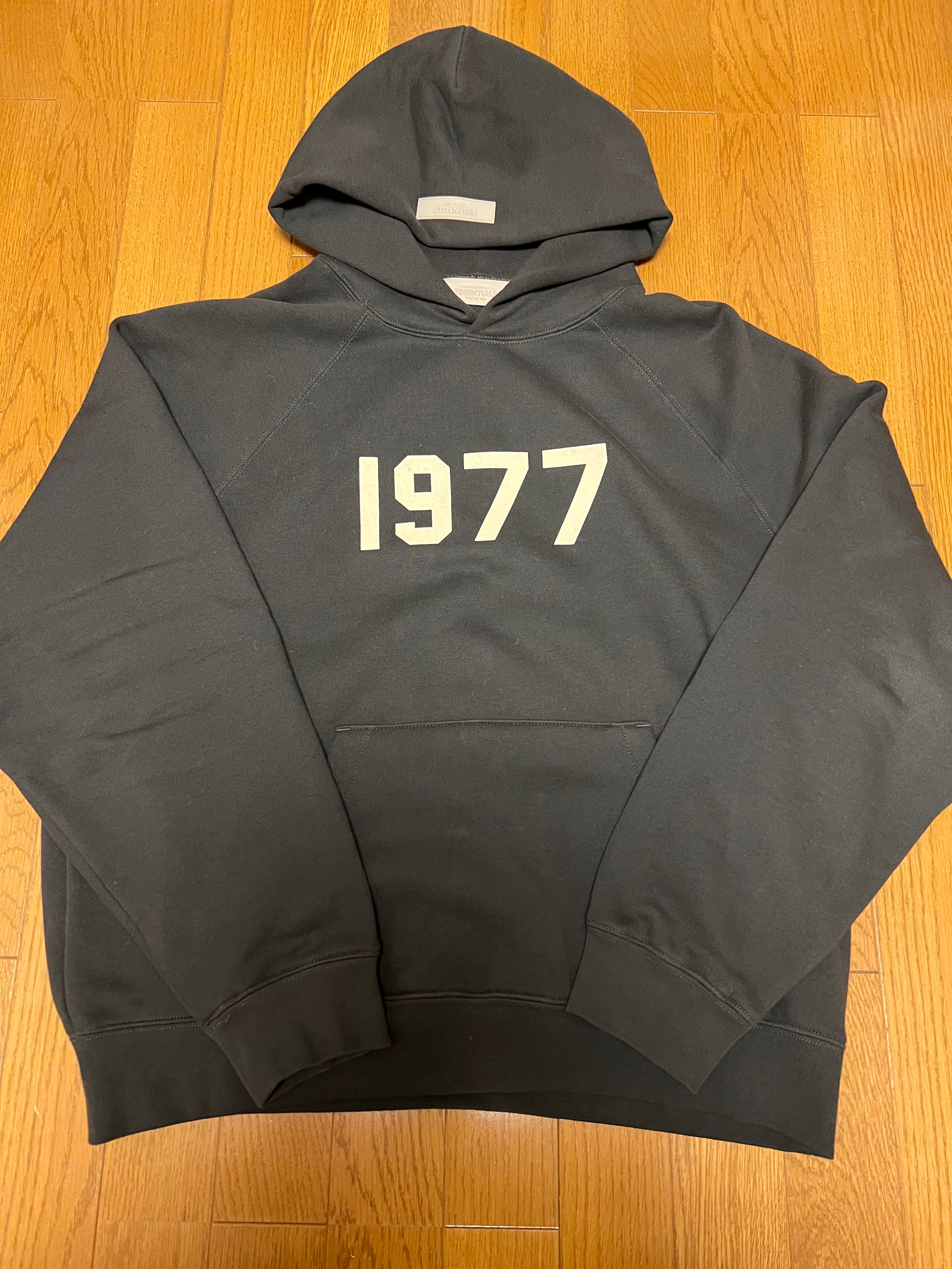 FEAR OF GOD ESSENTIALS 1977 HOODIE "Iron"